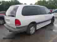 2000 Dodge Caravan SE with VIN 2B4GP44R4YR724699, listed as a IAAI auction lot 42923071 with 70,879 mi miles and . Bid and sale history available at DreamBid. Image 4.