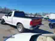 2000 Ford F-150 XL with VIN 1FTRF18W2YNB42014, listed as a IAAI auction lot 41827247 with Not provided miles and . Bid and sale history available at DreamBid. Image 3.