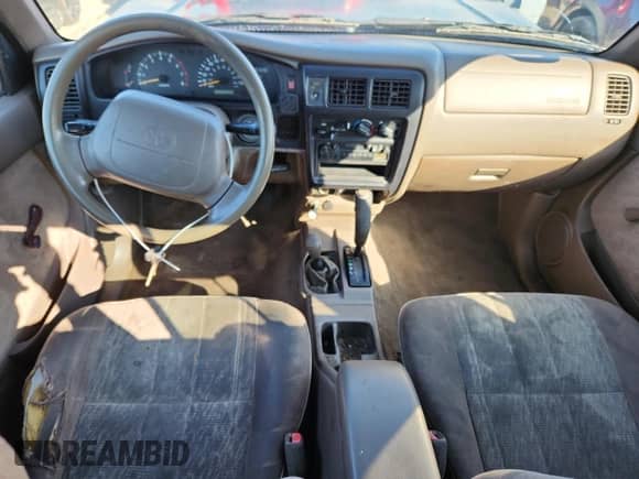 1999 Toyota Tacoma z VIN 4TAPM62N8XZ457865, wystawiony jako Copart lot #85175585 z przebiegiem 222 153 mil mil oraz Szkoda całkowita • Salvage title. Historia ofert i sprzedaży dostępna na DreamBid. Obrazek 8.