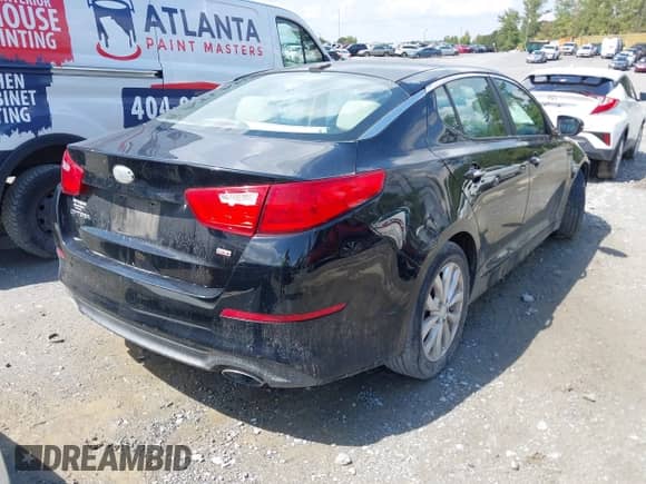 2014 Kia Optima LX with VIN 5XXGM4A76EG302498, listed as a IAAI auction lot 43129196 with 188,849 mi miles and . Bid and sale history available at DreamBid. Image 4.