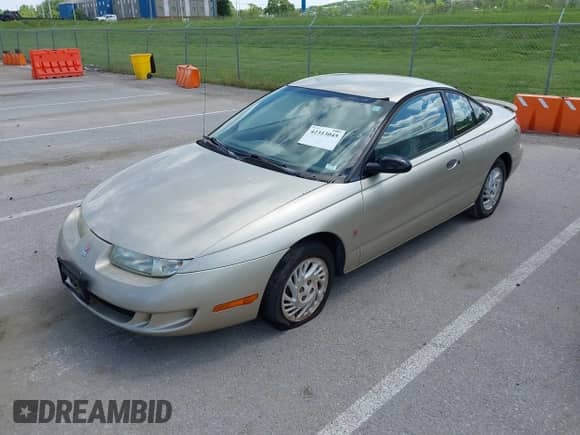 1999 Saturn SC with VIN 1G8ZP1288XZ370091, listed as a IAAI auction lot 42313045 with 126,614 mi miles and . Bid and sale history available at DreamBid. Image 2.