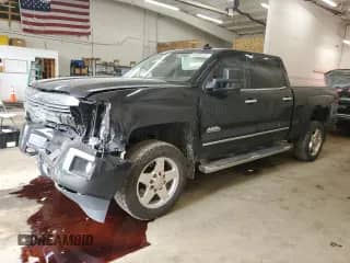 2015 Chevrolet Silverado 2500HD High Country z VIN 1GC1KXE83FF546139, wystawiony jako Copart lot #67849225 z przebiegiem 153 878 mil mil oraz Szkoda całkowita • Salvage title. Historia ofert i sprzedaży dostępna na DreamBid. Obrazek 1.
