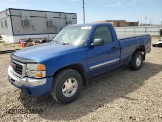 2003 GMC Sierra 1500 SLE z VIN 1GTEK14V43Z240678, wystawiony jako Copart lot #56372285 z przebiegiem 243 387 mil mil oraz Czysty tytuł • Clean title. Historia ofert i sprzedaży dostępna na DreamBid. Obrazek 1.