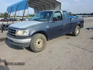 1999 Ford F-150 с VIN 1FTRX17W9XNC31446, выставлен на аукционе Copart как лот 71715185 с пробегом 202 323 миль миль и Списание • Salvage title. История ставок и продаж доступна на DreamBid. Изображение 1.