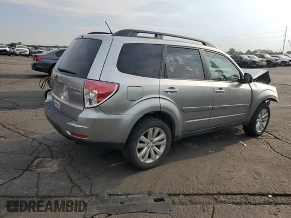 2011 Subaru Forester X Premium with VIN JF2SHADC1BH712339, listed as a Copart auction lot 66895135 with 183,845 mi miles and Salvage title. Bid and sale history available at DreamBid. Image 3.