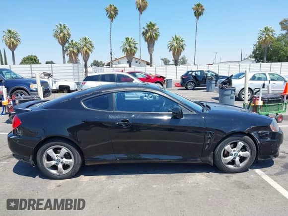 2005 Hyundai Tiburon GS с VIN KMHHM65DX5U157715, выставлен на аукционе IAAI как лот 42749627 с пробегом 111 217 миль миль и . История ставок и продаж доступна на DreamBid. Изображение 13.