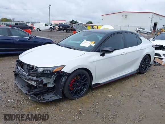 2023 Toyota Camry TRD with VIN 4T1KZ1AKXPU082161, listed as a IAAI auction lot 43388188 with 42,868 mi miles and . Bid and sale history available at DreamBid. Image 2.