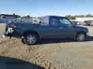 1997 Toyota Tacoma with VIN 4TAVL52N7VZ330736, listed as a Copart auction lot 82432415 with 376,229 mi miles and Salvage title. Bid and sale history available at DreamBid. Image 3.