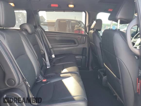 2025 Honda Odyssey Sport-L z VIN 5FNRL6H75SB007548, wystawiony jako Copart lot #84157945 z przebiegiem 23 280 mil mil oraz Szkoda całkowita • Salvage title. Historia ofert i sprzedaży dostępna na DreamBid. Obrazek 11.