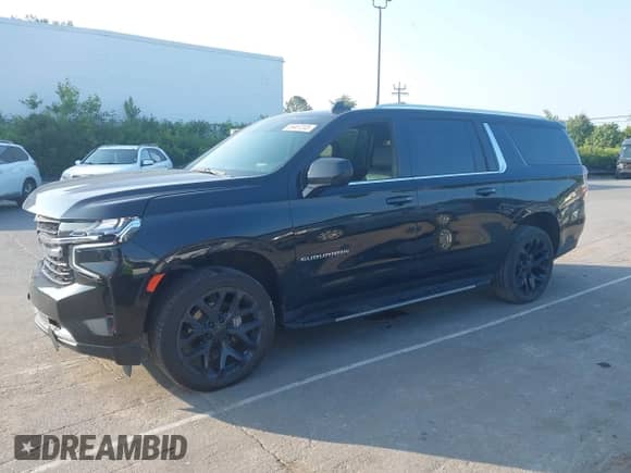 2023 Chevrolet Suburban LT with VIN 1GNSKCKD4PR250410, listed as a IAAI auction lot 42404471 with 71,552 mi miles and . Bid and sale history available at DreamBid. Image 2.
