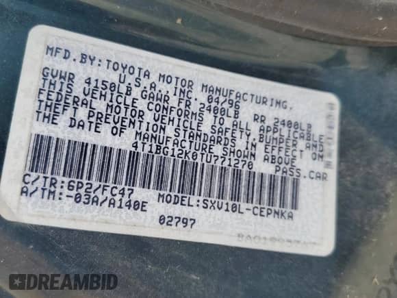 1996 Toyota Camry DX z VIN 4T1BG12K0TU771270, wystawiony jako Copart lot #64760345 z przebiegiem 198 961 mil mil oraz Nie do naprawy • Non repairable. Historia ofert i sprzedaży dostępna na DreamBid. Obrazek 12.