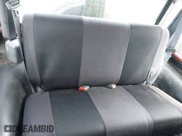 2002 Jeep Wrangler X z VIN 1J4FA39S22P731157, wystawiony jako IAAI lot #43240376 z przebiegiem 154 782 mil mil oraz . Historia ofert i sprzedaży dostępna na DreamBid. Obrazek 8.