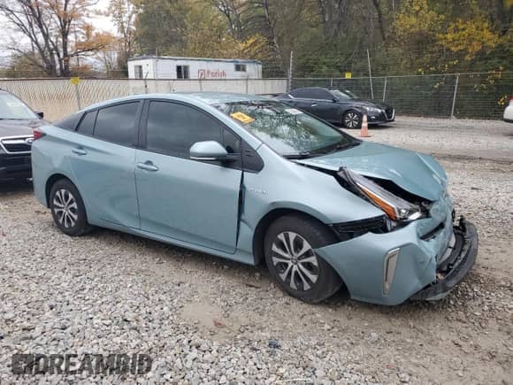 2021 Toyota Prius XLE with VIN JTDL9MFU0M3031094, listed as a Copart auction lot 82648995 with 50,455 mi miles and Salvage title. Bid and sale history available at DreamBid. Image 4.