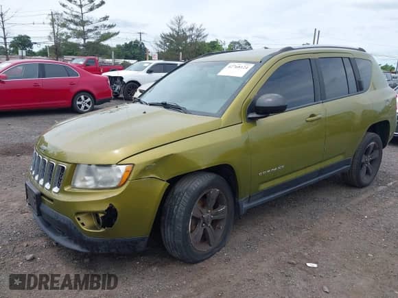 2012 Jeep Compass Sport z VIN 1C4NJDBB8CD577395, wystawiony jako IAAI lot #42768124 z przebiegiem 127 518 mil mil oraz . Historia ofert i sprzedaży dostępna na DreamBid. Obrazek 2.