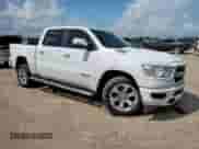 2020 Ram 1500 Lone Star with VIN 1C6RREFM0LN245982, listed as a Copart auction lot 61289665 with 97,036 mi miles and Salvage title. Bid and sale history available at DreamBid. Image 4.