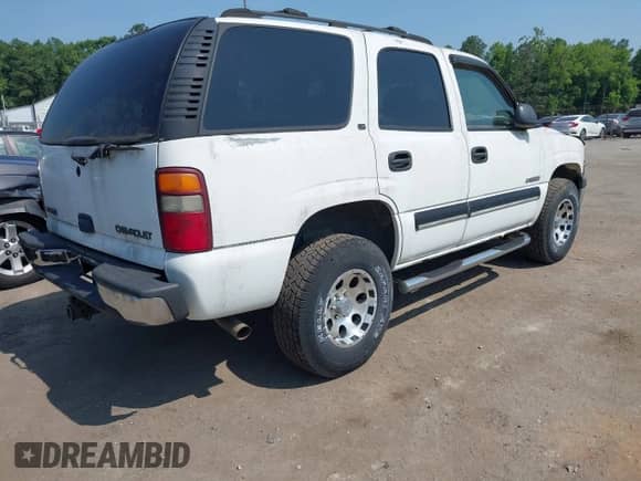 2000 Chevrolet Tahoe LS z VIN 1GNEK13T9YJ175291, wystawiony jako IAAI lot #42476752 z przebiegiem 120 619 mil mil oraz . Historia ofert i sprzedaży dostępna na DreamBid. Obrazek 4.