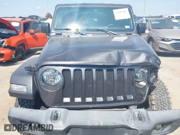 2020 Jeep Wrangler Sport S with VIN 1C4GJXAG6LW162569, listed as a IAAI auction lot 43205402 with 49,177 mi miles and . Bid and sale history available at DreamBid. Image 6.