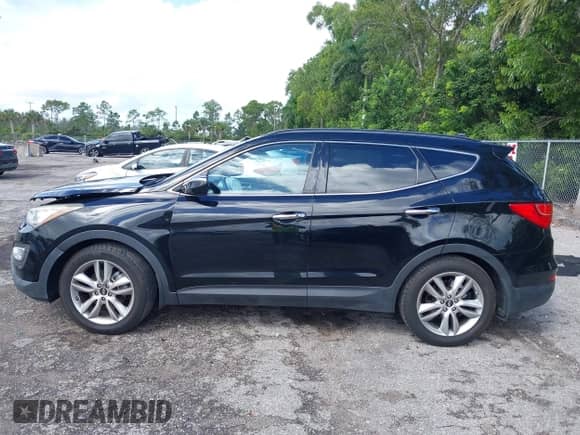 2015 Hyundai Santa Fe с VIN 5XYZW4LA6FG249410, выставлен на аукционе IAAI как лот 43410318 с пробегом 76 571 миль миль и . История ставок и продаж доступна на DreamBid. Изображение 14.