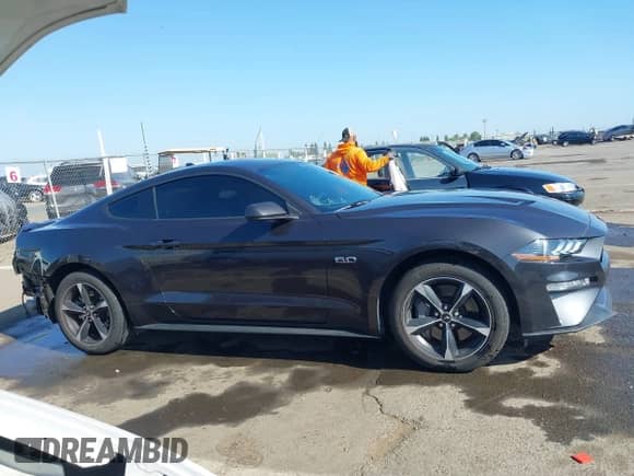2022 Ford Mustang GT with VIN 1FA6P8CF6N5135181, listed as a IAAI auction lot 42171291 with 22,371 mi miles and . Bid and sale history available at DreamBid. Image 14.
