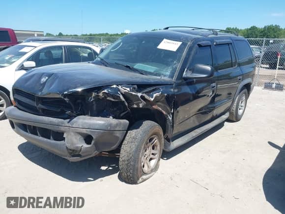2003 Dodge Durango Sport with VIN 1D4HS38N83F590127, listed as a IAAI auction lot 42803945 with 182,785 mi miles and . Bid and sale history available at DreamBid. Image 2.