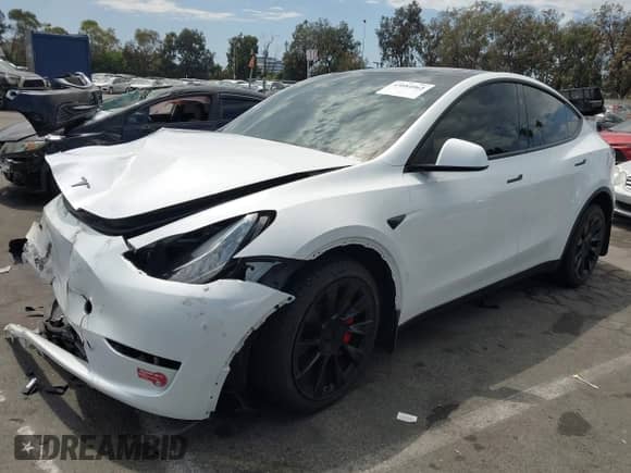 2023 Tesla Model Y Long Range with VIN 7SAYGDEE7PA124885, listed as a IAAI auction lot 43084065 with 22,983 mi miles and . Bid and sale history available at DreamBid. Image 18.