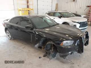 2014 Dodge Charger RT Max with VIN 2C3CDXCT0EH330504, listed as a IAAI auction lot 42957632 with 173,211 mi miles and . Bid and sale history available at DreamBid. Image 1.