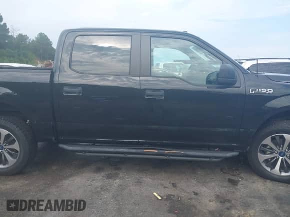 2019 Ford F-150 XL with VIN 1FTEW1E54KFB76726, listed as a IAAI auction lot 42970886 with 128,574 mi miles and . Bid and sale history available at DreamBid. Image 13.