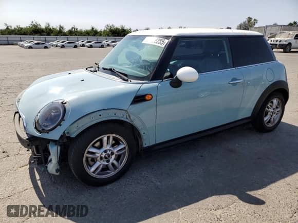 2011 MINI Hardtop with VIN WMWSU3C52BT096248, listed as a Copart auction lot 62008285 with 129,794 mi miles and Salvage title. Bid and sale history available at DreamBid. Image 1.