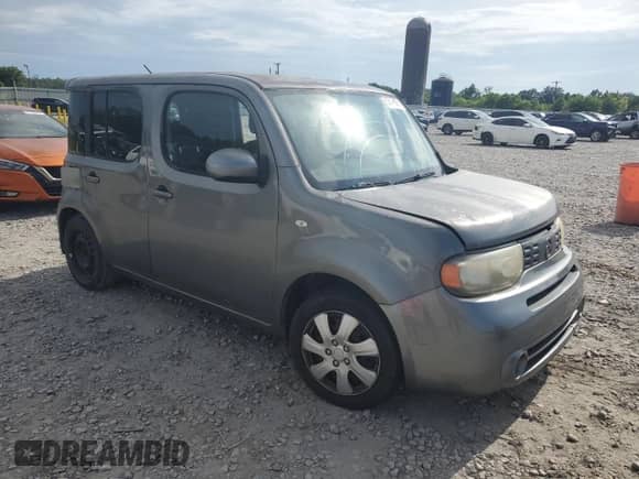2012 Nissan Cube SL с VIN JN8AZ2KR2CT251403, выставлен на аукционе Copart как лот 60617395 с пробегом 188 261 миль миль и Чистый • Clean title. История ставок и продаж доступна на DreamBid. Изображение 4.