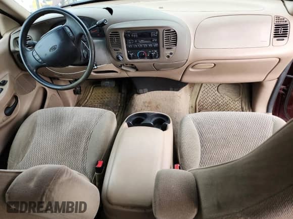 1998 Ford F-150 XL с VIN 1FTEX18L4WKA03275, выставлен на аукционе Copart как лот 84770115 с пробегом 173 880 миль миль и Чистый • Clean title. История ставок и продаж доступна на DreamBid. Изображение 8.