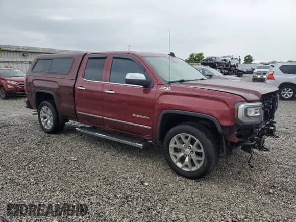 2016 GMC Sierra 1500 SLT with VIN 1GTV2NEC5GZ207604, listed as a Copart auction lot 62514355 with 122,220 mi miles and Salvage title. Bid and sale history available at DreamBid. Image 4.