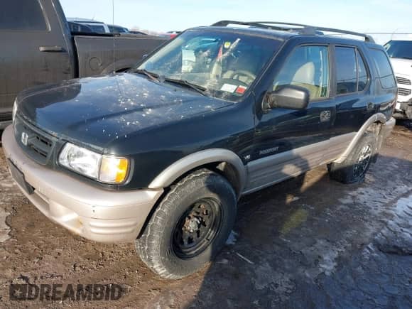 2001 Honda Passport LX with VIN 4S6DM58W314408078, listed as a IAAI auction lot 41733763 with 172,394 mi miles and . Bid and sale history available at DreamBid. Image 2.