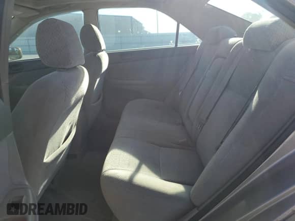 2003 Toyota Camry LE z VIN 4T1BE32KX3U778650, wystawiony jako Copart lot #86456805 z przebiegiem 135 913 mil mil oraz Szkoda całkowita • Salvage title. Historia ofert i sprzedaży dostępna na DreamBid. Obrazek 10.