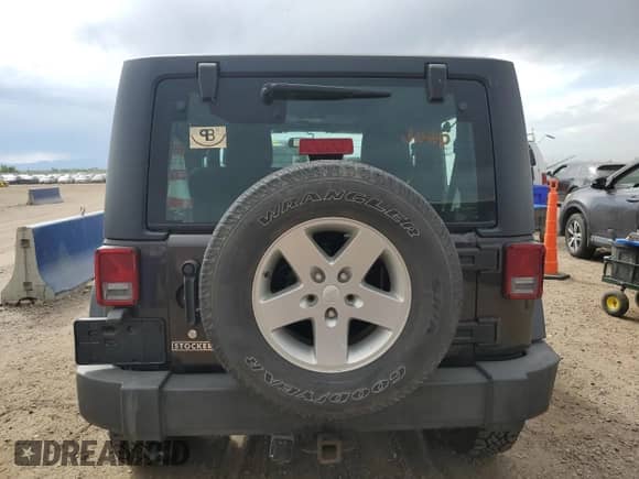 2013 Jeep Wrangler Sport with VIN 1C4AJWAG8DL679343, listed as a Copart auction lot 80122745 with 125,328 mi miles and Salvage title. Bid and sale history available at DreamBid. Image 6.