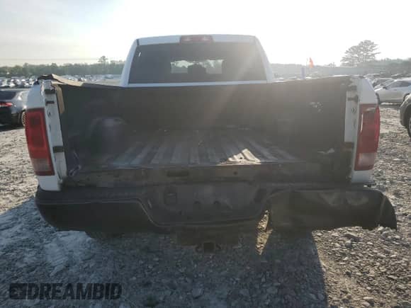 2012 Ram 1500 Tradesman z VIN 1C6RD6FP7CS175218, wystawiony jako Copart lot #57409305 z przebiegiem 303 140 mil mil oraz Szkoda całkowita • Salvage title. Historia ofert i sprzedaży dostępna na DreamBid. Obrazek 6.