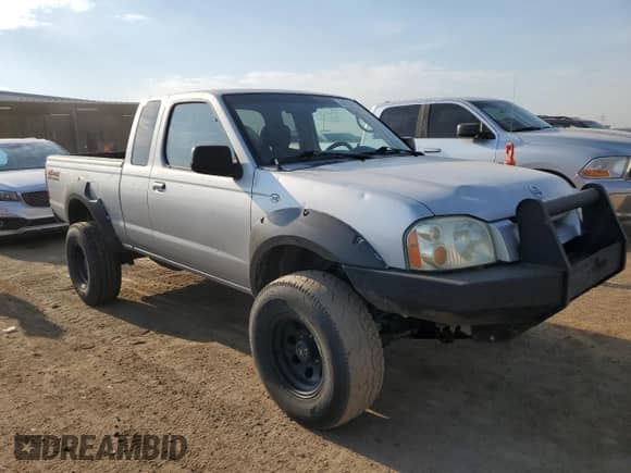 2004 Nissan Frontier XE Desert Runner z VIN 1N6ED26Y54C481898, wystawiony jako Copart lot #68713725 z przebiegiem 126 682 mil mil oraz Czysty tytuł • Clean title. Historia ofert i sprzedaży dostępna na DreamBid. Obrazek 4.