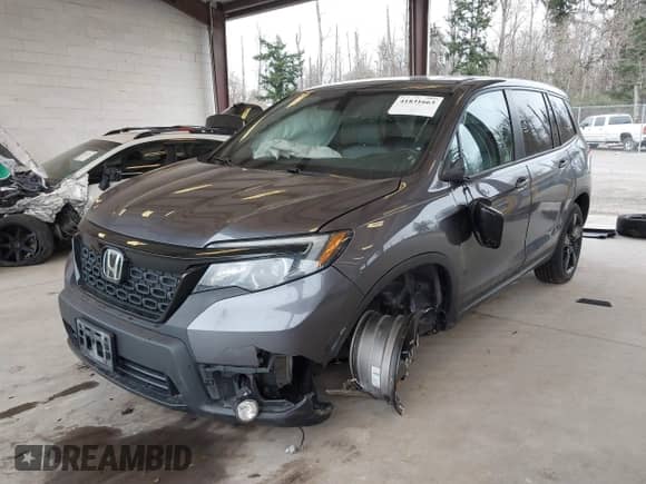2019 Honda Passport EX-L with VIN 5FNYF8H5XKB025864, listed as a IAAI auction lot 41831663 with 73,130 mi miles and . Bid and sale history available at DreamBid. Image 2.