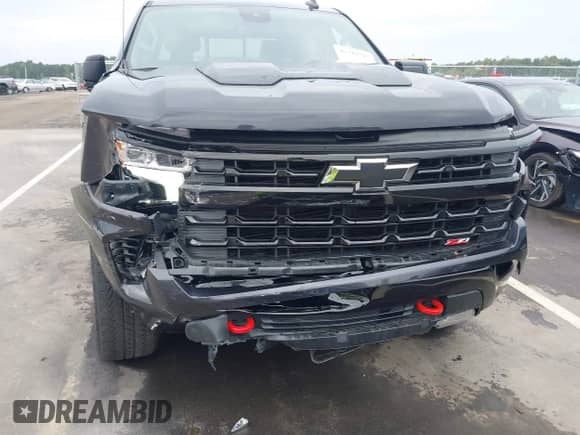 2024 Chevrolet Silverado 1500 LT Trail Boss with VIN 3GCUDFED9RG415847, listed as a IAAI auction lot 43342787 with 7,479 mi miles and . Bid and sale history available at DreamBid. Image 19.