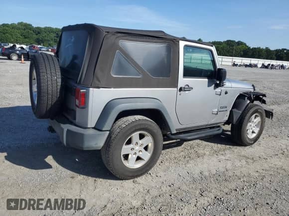 2016 Jeep Wrangler Willys Wheeler with VIN 1C4AJWAG4GL119680, listed as a Copart auction lot 65416205 with 96,057 mi miles and Salvage title. Bid and sale history available at DreamBid. Image 3.