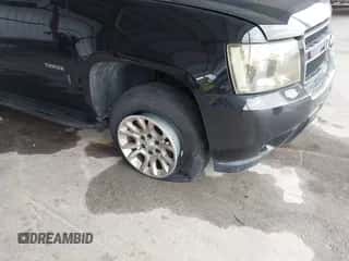 2007 Chevrolet Tahoe Police z VIN 1GNEC03057R342002, wystawiony jako IAAI lot #42380219 z przebiegiem 156 397 mil mil oraz . Historia ofert i sprzedaży dostępna na DreamBid. Obrazek 6.