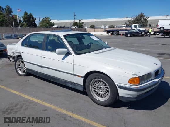 1998 BMW 7 Series 740iL with VIN WBAGJ8328WDM15945, listed as a IAAI auction lot 42809205 with 239,449 mi miles and . Bid and sale history available at DreamBid. Image 1.