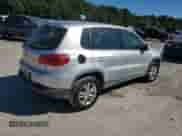 2014 Volkswagen Tiguan S z VIN WVGAV3AX7EW621724, wystawiony jako Copart lot #86763145 z przebiegiem 148 678 mil mil oraz Czysty tytuł • Clean title. Historia ofert i sprzedaży dostępna na DreamBid. Obrazek 3.