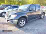 2011 Nissan Frontier Pro-4X with VIN 1N6AD0EV4BC420677, listed as a IAAI auction lot 43050825 with 142,954 mi miles and . Bid and sale history available at DreamBid. Image 2.