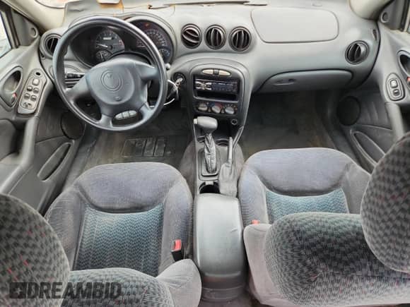 2002 Pontiac Grand Am SE1 with VIN 1G2NF52F92C113762, listed as a Copart auction lot 71672305 with 180,444 mi miles and Salvage title. Bid and sale history available at DreamBid. Image 8.