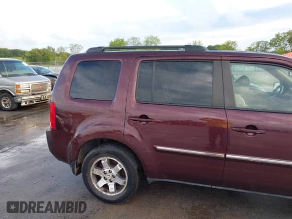 2009 Honda Pilot Touring with VIN 5FNYF38819B022195, listed as a IAAI auction lot 42850497 with 192,072 mi miles and . Bid and sale history available at DreamBid. Image 12.