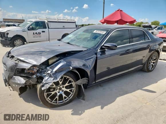 2015 Chrysler 300 Limited with VIN 2C3CCAAG9FH931448, listed as a Copart auction lot 82328945 with 132,848 mi miles and Salvage title. Bid and sale history available at DreamBid. Image 1.