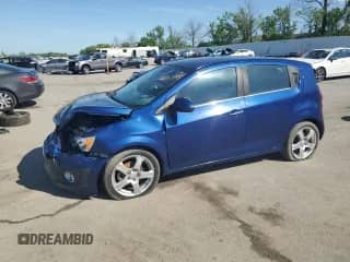 2012 Chevrolet Sonic LTZ with VIN 1G1JE6SH2C4211444, listed as a Copart auction lot 54013075 with 97,378 mi miles and Salvage title. Bid and sale history available at DreamBid. Image 1.