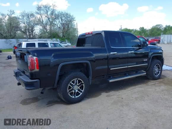 2016 GMC Sierra 1500 SLE with VIN 1GTV2MEC5GZ106217, listed as a IAAI auction lot 42243559 with 136,855 mi miles and . Bid and sale history available at DreamBid. Image 4.