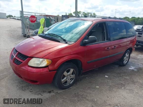 2006 Dodge Caravan SXT with VIN 1D4GP45R46B571953, listed as a IAAI auction lot 43032725 with Not provided miles and . Bid and sale history available at DreamBid. Image 2.