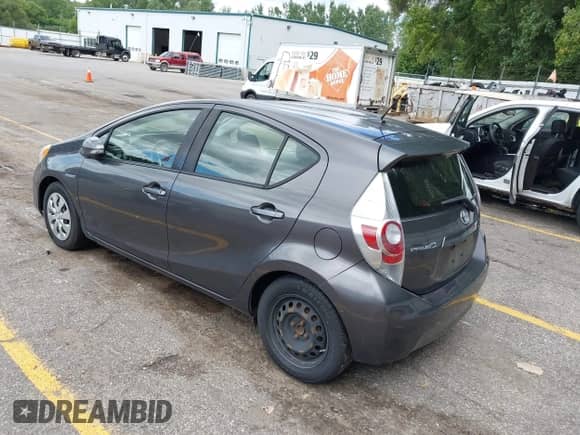 2014 Toyota Prius One with VIN JTDKDTB38E1562235, listed as a IAAI auction lot 43048418 with 164,639 mi miles and . Bid and sale history available at DreamBid. Image 3.